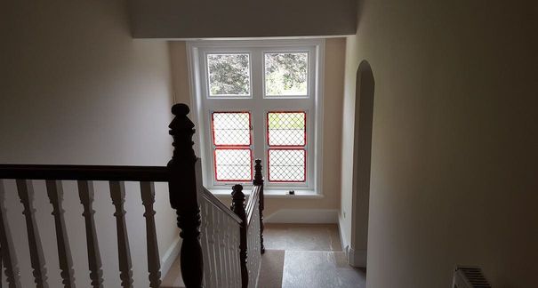 Refurbished stair landing area, with a new stained glass sash window